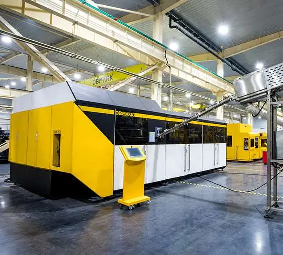 Máy thổi chai xoay tròn DMK-R