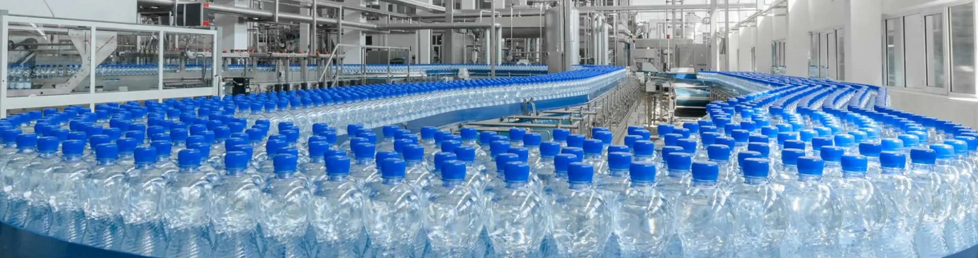 Máy thổi chiết đóng nắp chai